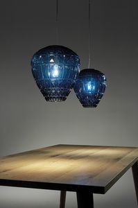Reflex, Glaslampe mit dekorativen geometrischen Elementen